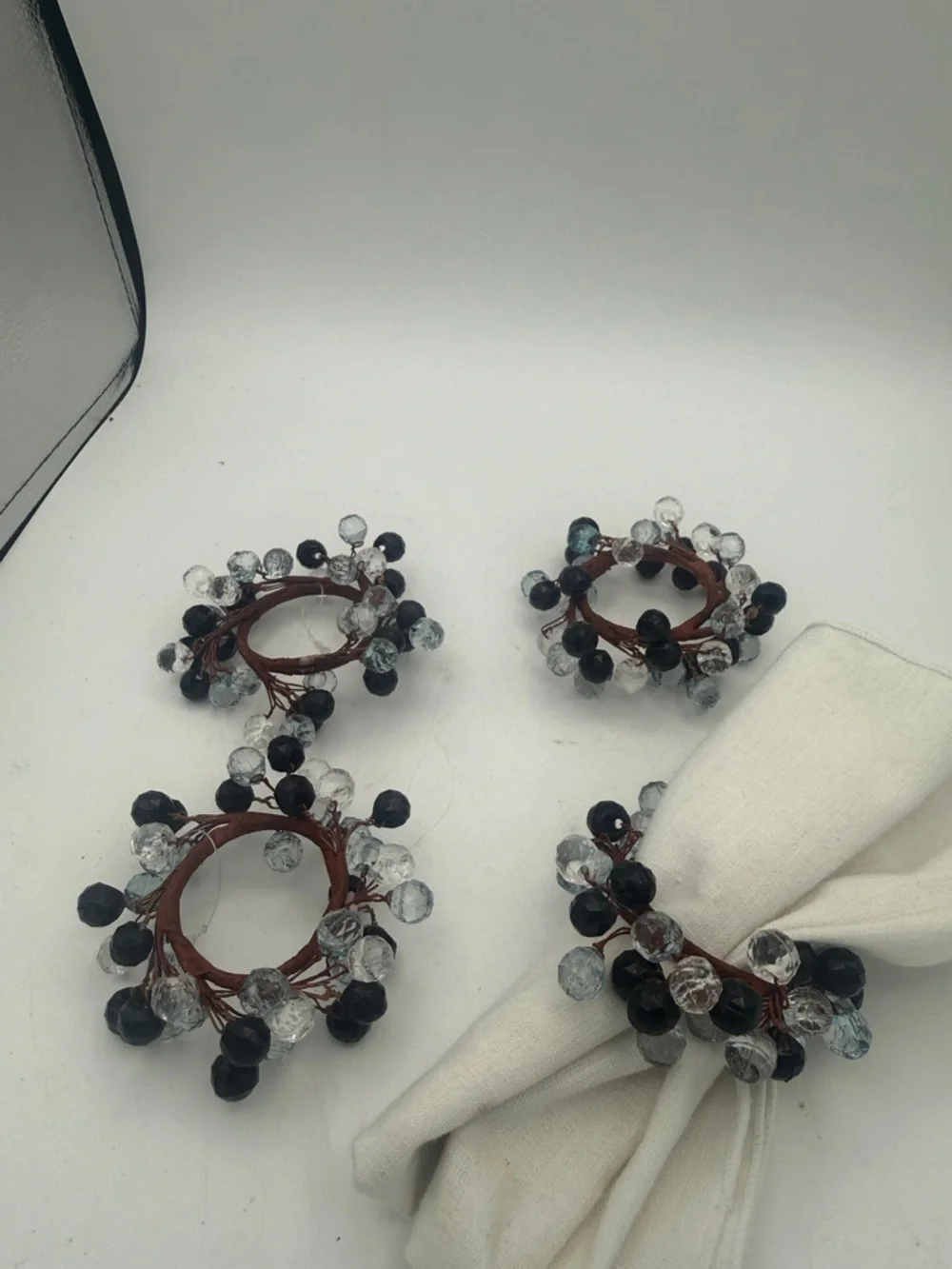 Cluster of black / clear beaded Napkin Rings holders set of 4